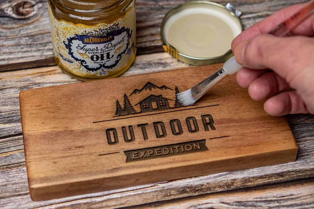 Sealing an engraving on finished wood